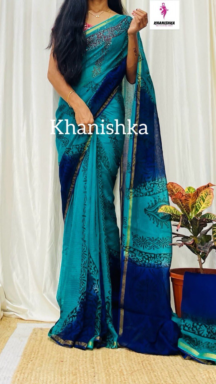 TRENDBUY Shibori print mulmul cotton saree in vibrant teal blue with deep blue contrast pallu and zari border, perfect for ethnic wear.