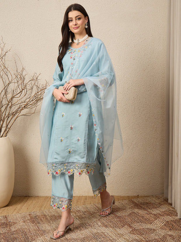 TRENDBUY Women's Sky Blue Viscose Roman Silk Kurta Set with floral embroidery and organza dupatta, modeled standing with clutch.