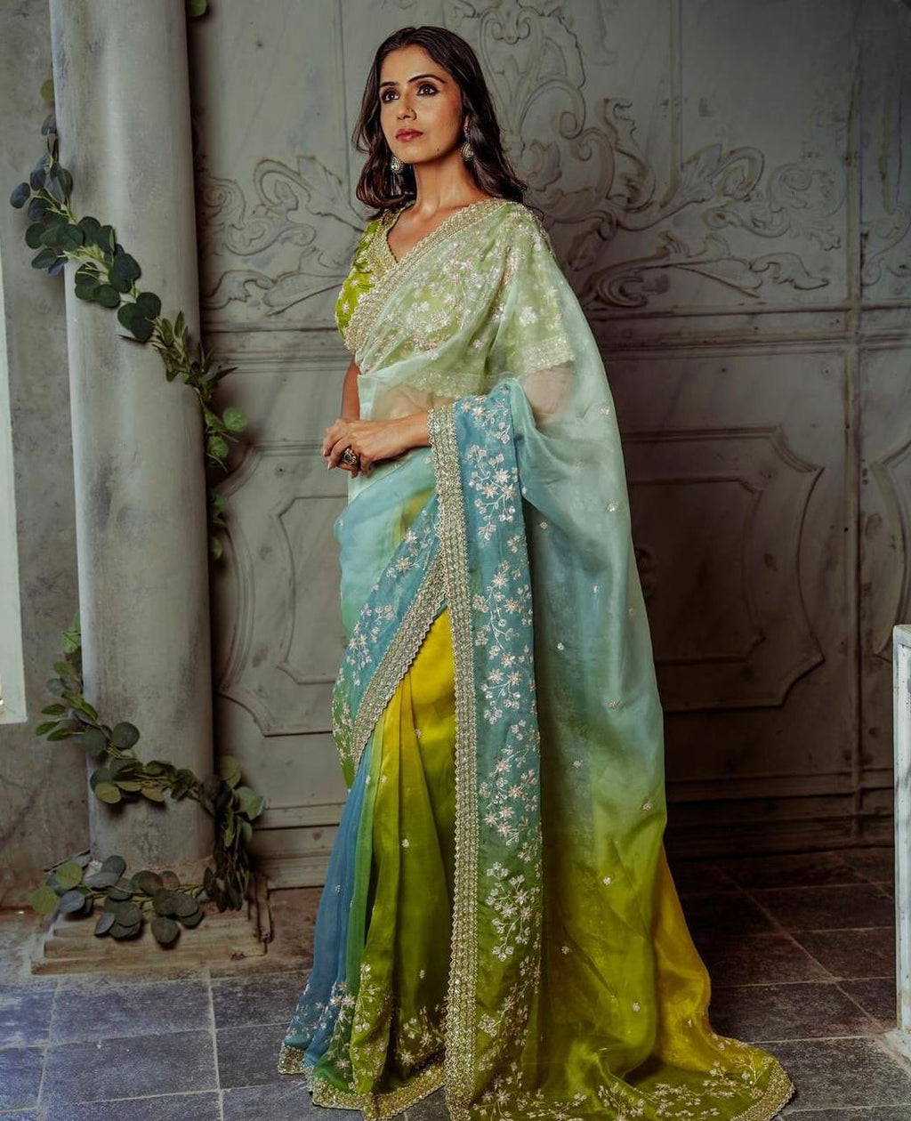 Model in TRENDBUY Mint-Yellow Ombre Organza Saree with sequin embroidery, posing elegantly.
