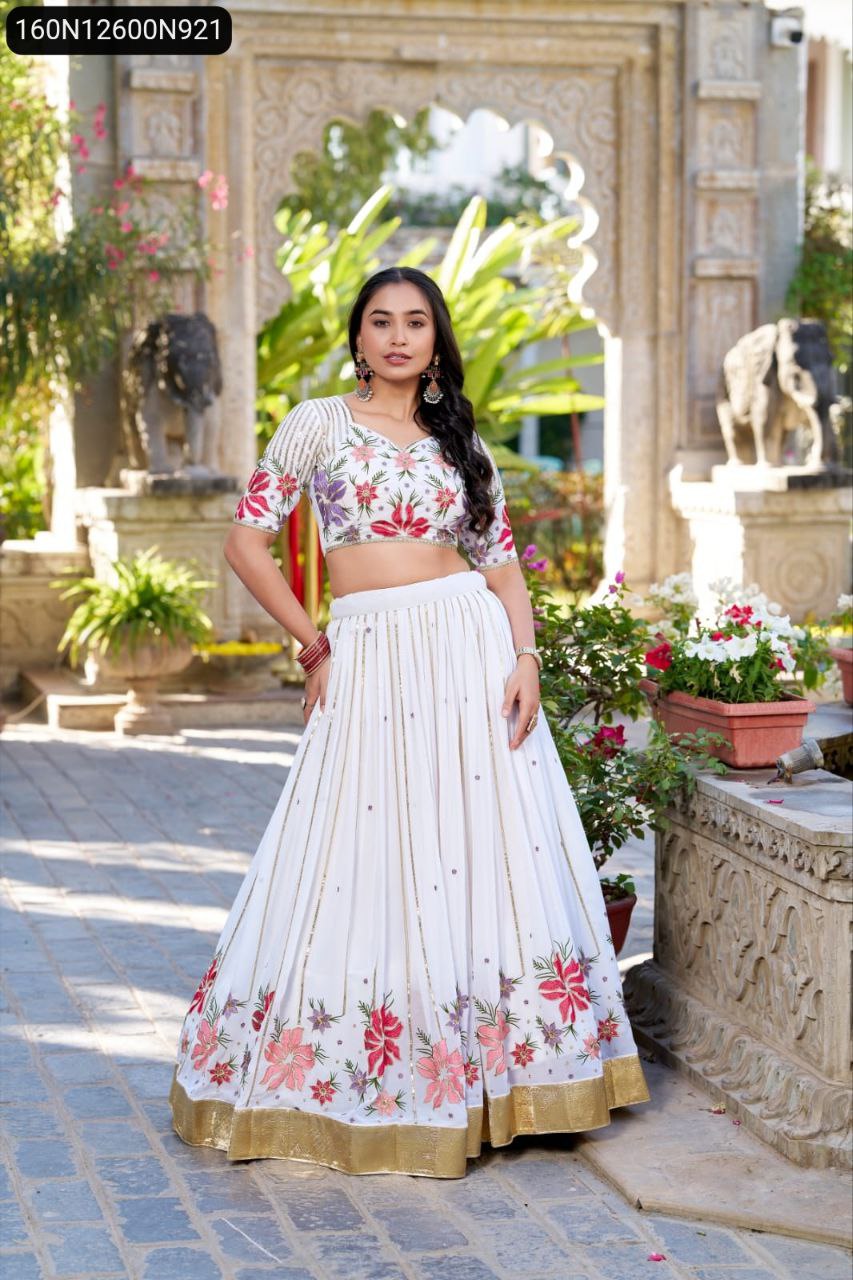 TRENDBUY Embroidered Georgette Lehenga for women, full body front view, model looking at camera in a vibrant floral outfit