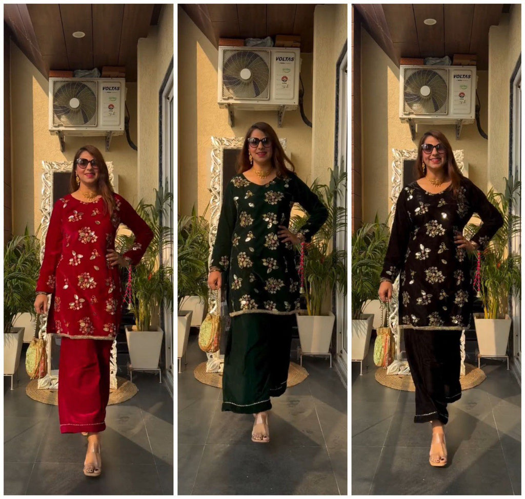 Model showcasing three velvet cord sets: maroon, emerald green, and black, all with sequin embroidery, on a balcony.