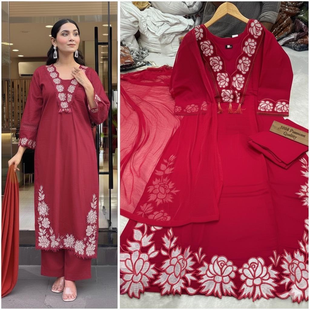 TRENDBUY Maroon Roman Silk Embroidered Kurta Pant Dupatta Set, elegant model posing