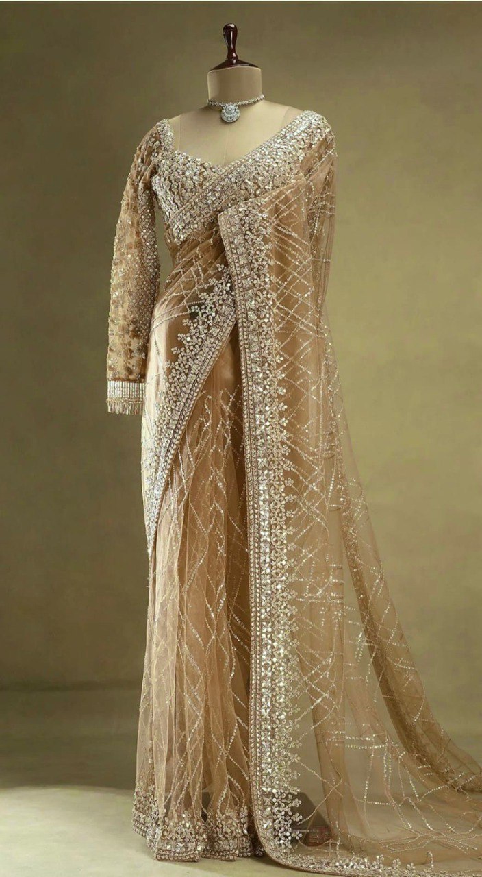 Full view of Pari Golden Mono Net Saree with elaborate sequin and zari embroidery draped on a mannequin