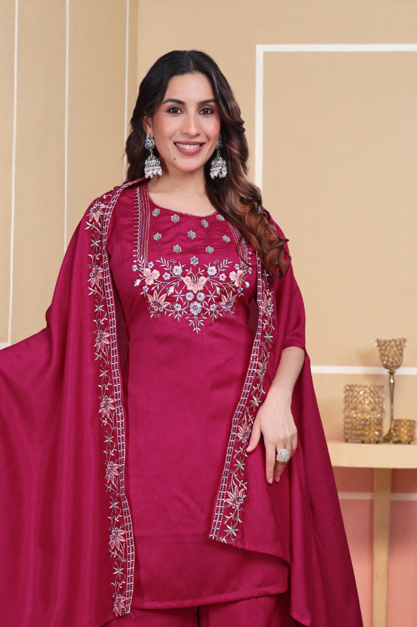 TRENDBUY model in magenta Vichitra Silk embroidered kurti, close-up, smiling.