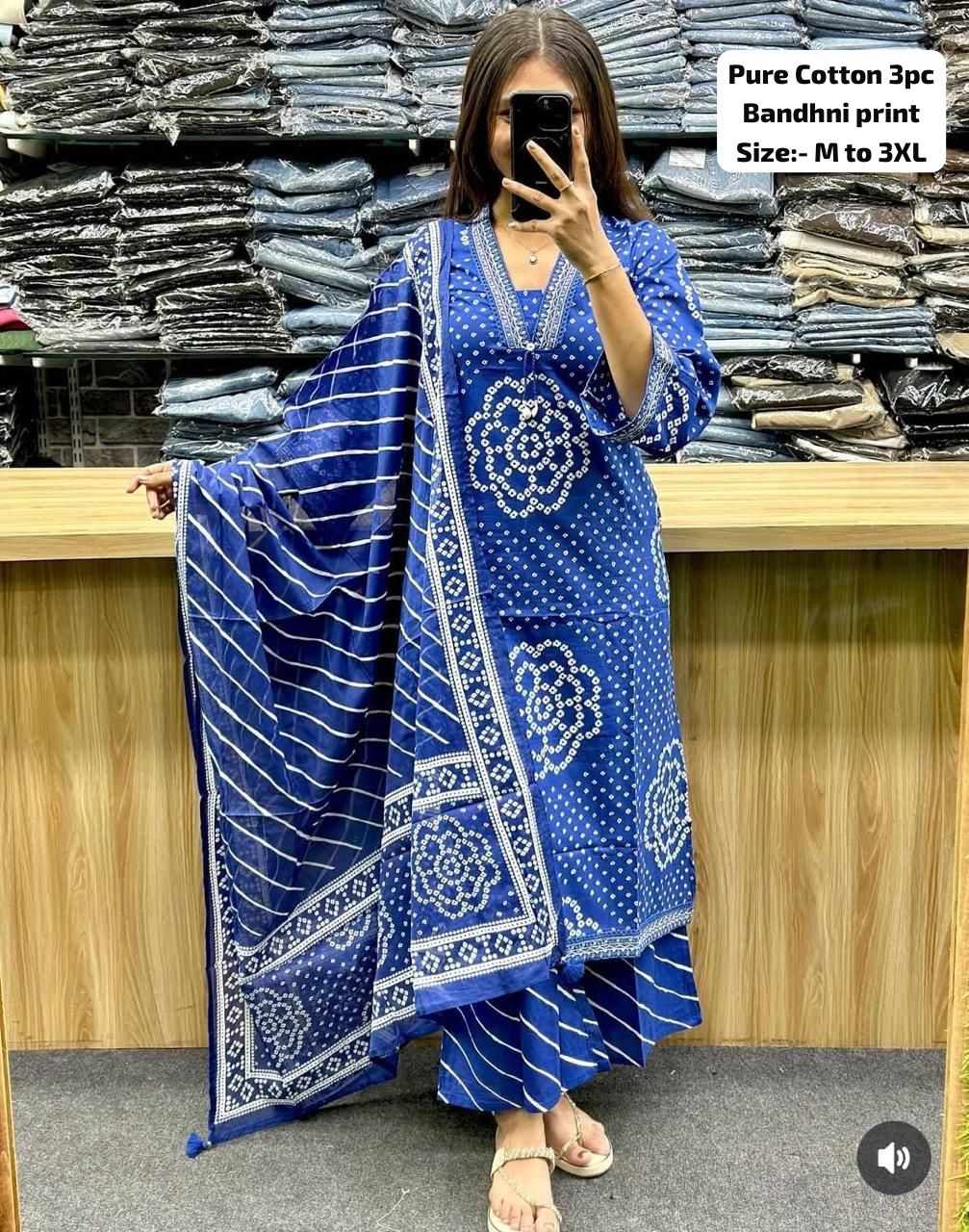 Elegant royal blue Bandhani straight cut cotton kurta set with dupatta, worn by a model.