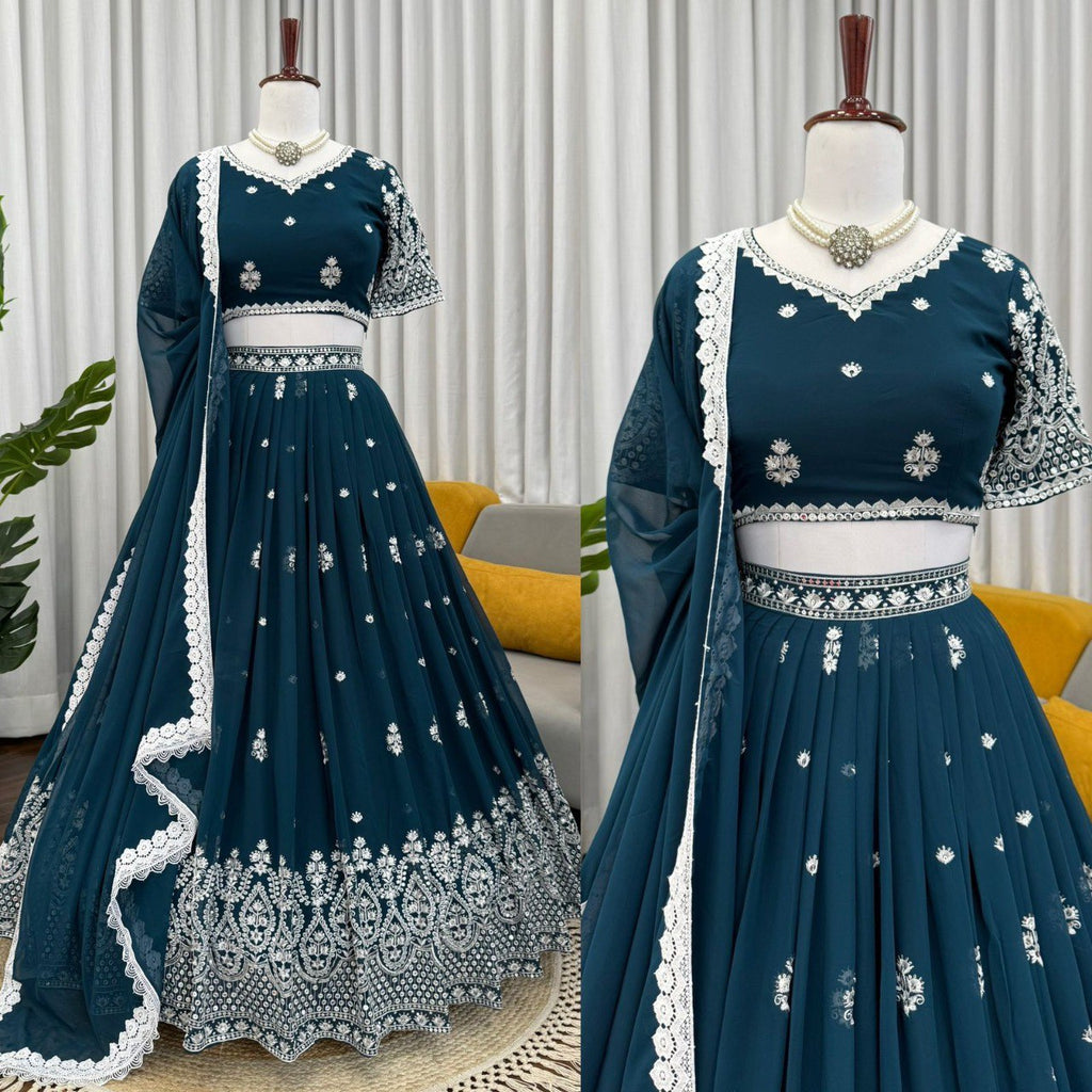 Full view of Teal Blue Faux Georgette Lehenga Choli set with sequin embroidery on mannequin.