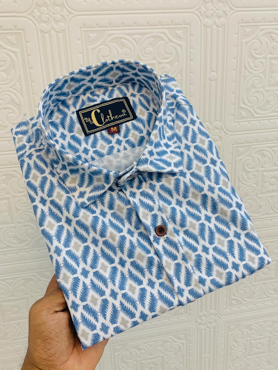 Folded men's half-sleeve cotton shirt with blue geometric pattern by TRENDBUY.