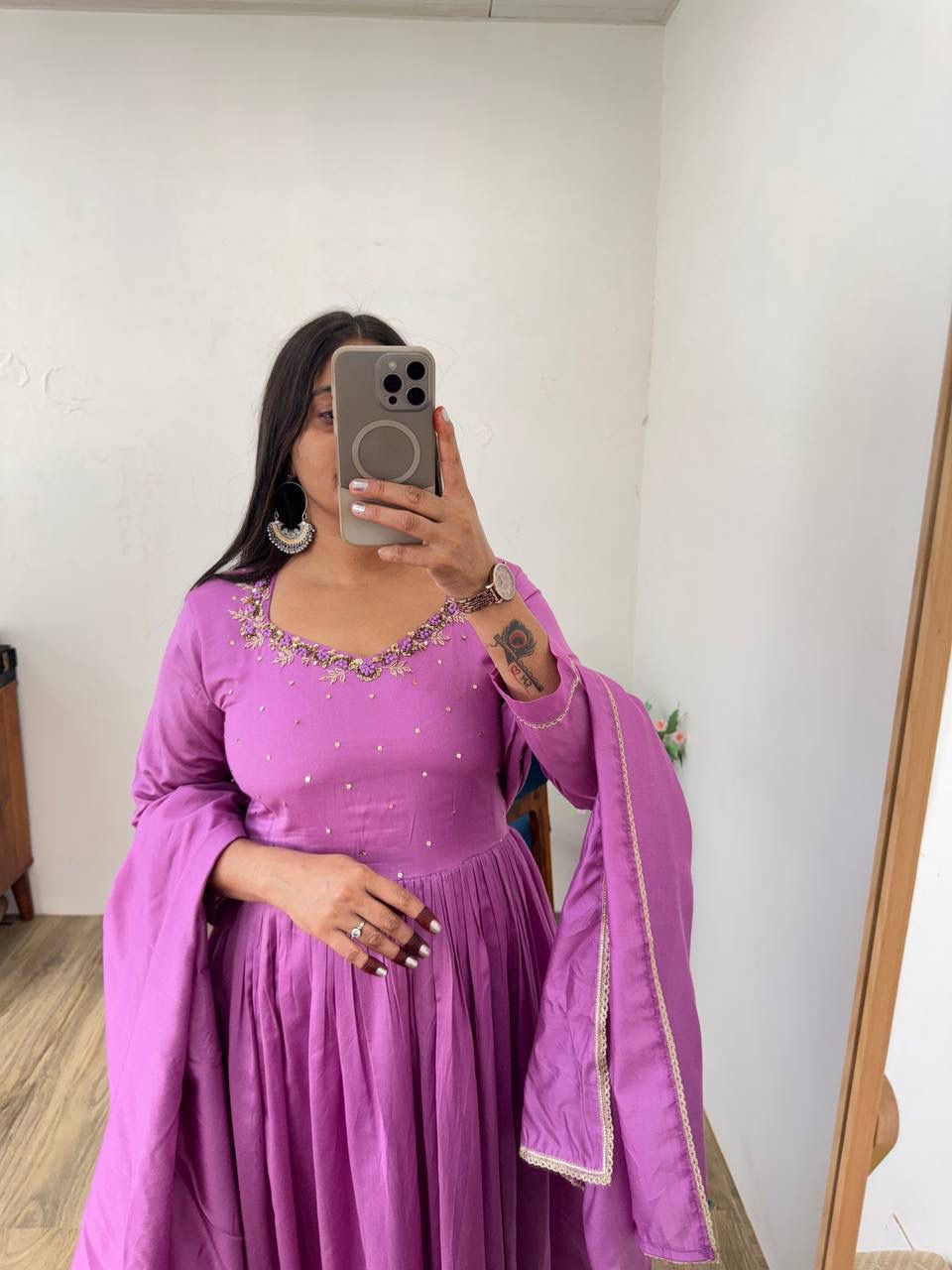 Model in light purple Mul Cotton Chanderi gown, showcasing embroidered neckline, full-length mirror shot.