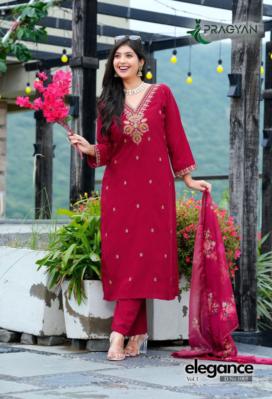 Elegant model in maroon heavy viscose rayon embroidered straight cut kurti set with digital print dupatta.