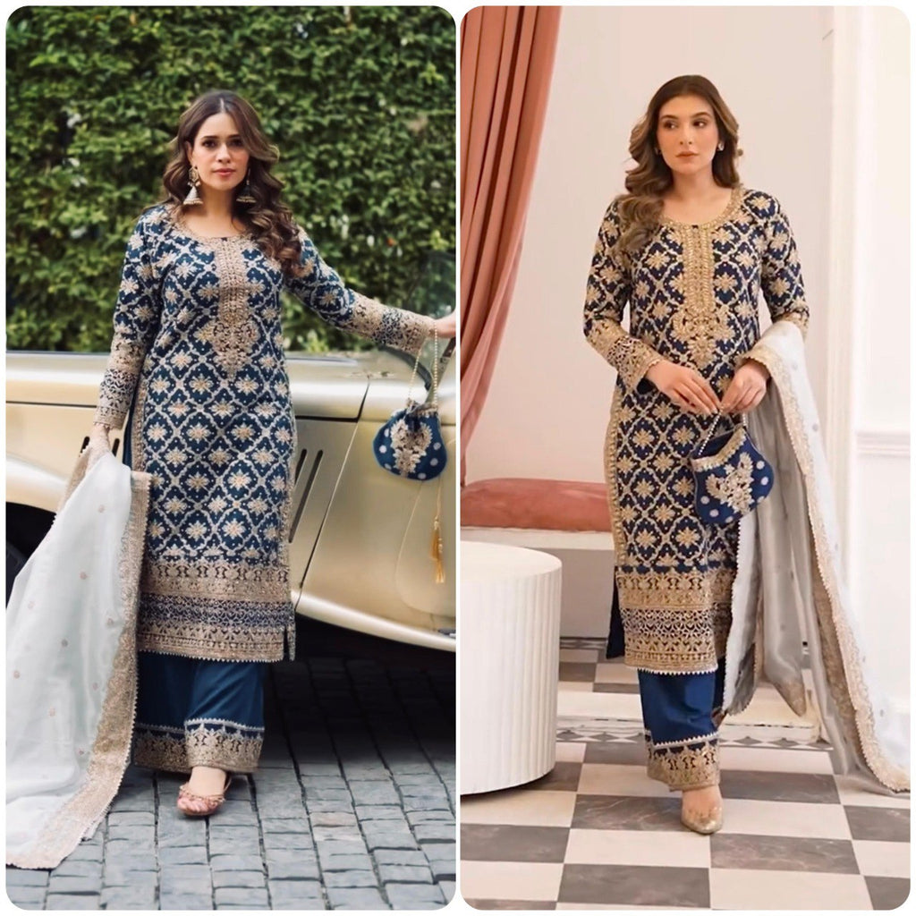 Model wearing TRENDBUY navy blue embroidered plazzo suit with a light blue dupatta next to a vintage car and indoors