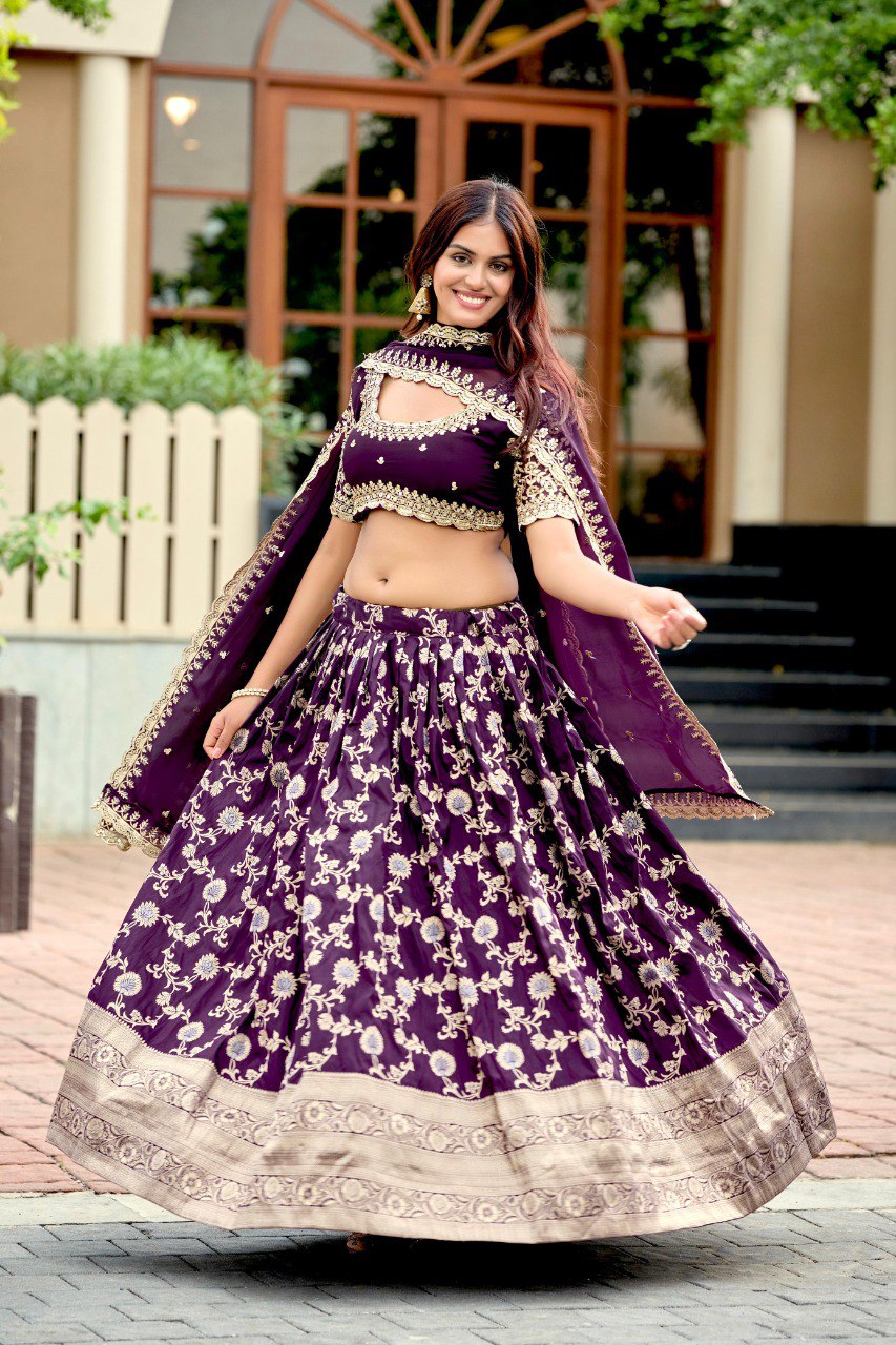 Full shot of model twirling gracefully in a purple embroidered Jacquard Silk Lehenga Choli set, highlighting the flair.