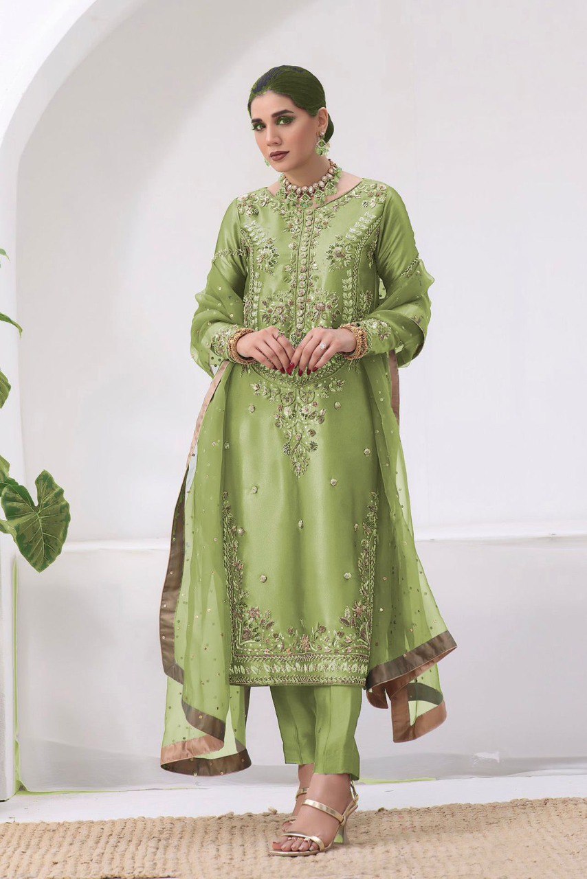 TRENDBUY Pakistani Silk Embroidered Suit Set in Pistachio Green, model front view