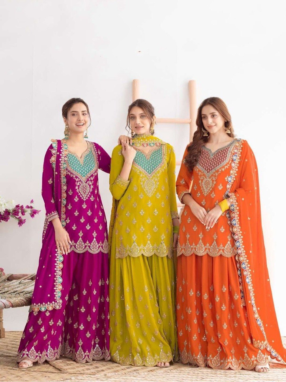 Three models showcasing the Fuchsia, Lime Green, and Tangerine Chinon Silk Sharara suits with embroidery.