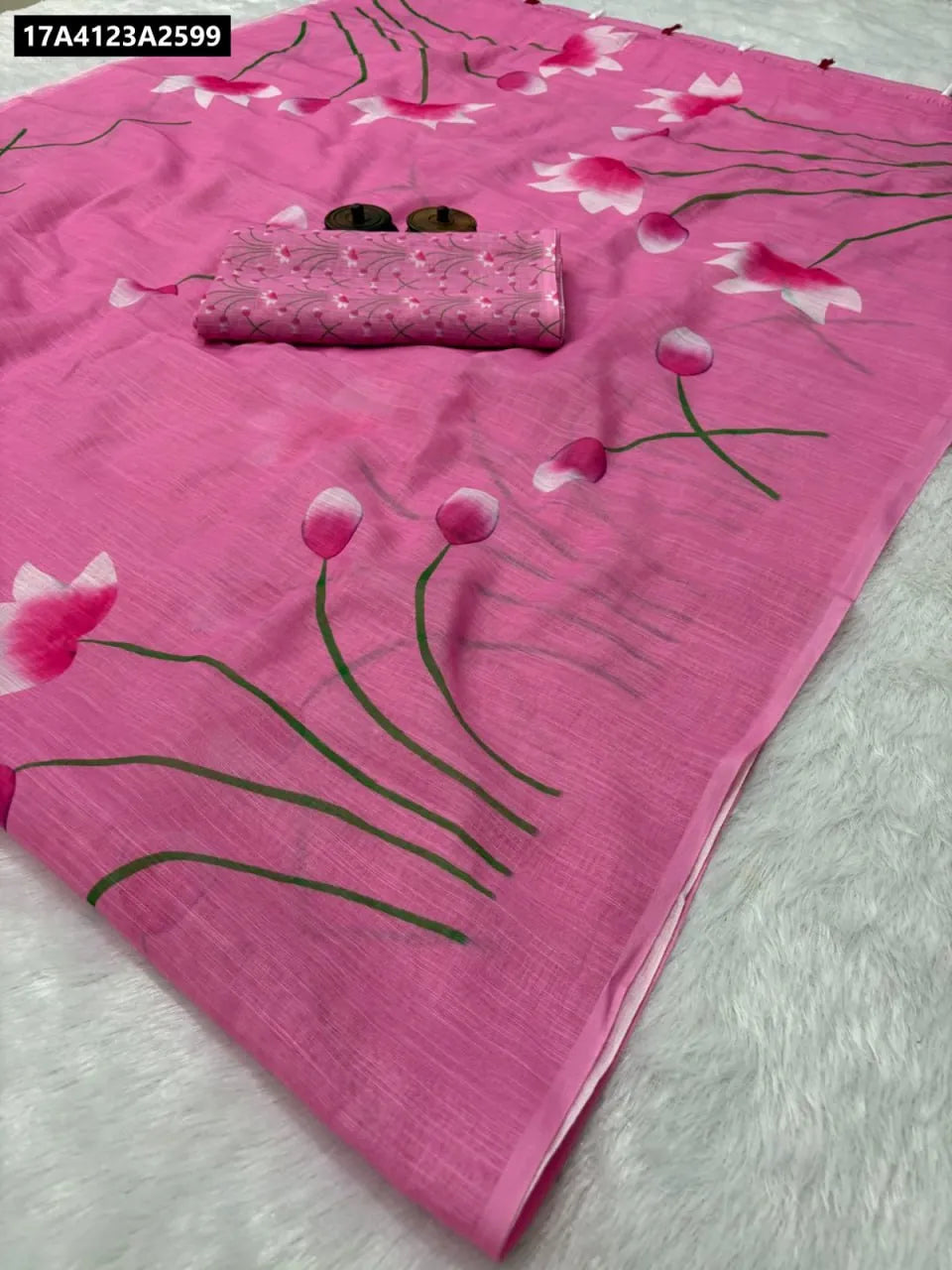 TRENDBUY Pink Linen Cotton Saree with digital floral print and tassels, front view flat lay.