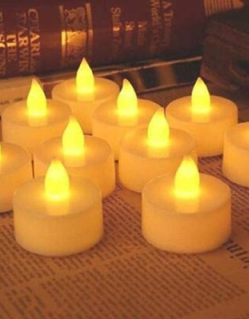 12 white plastic flameless LED tealight candles, smokeless and safe illumination.