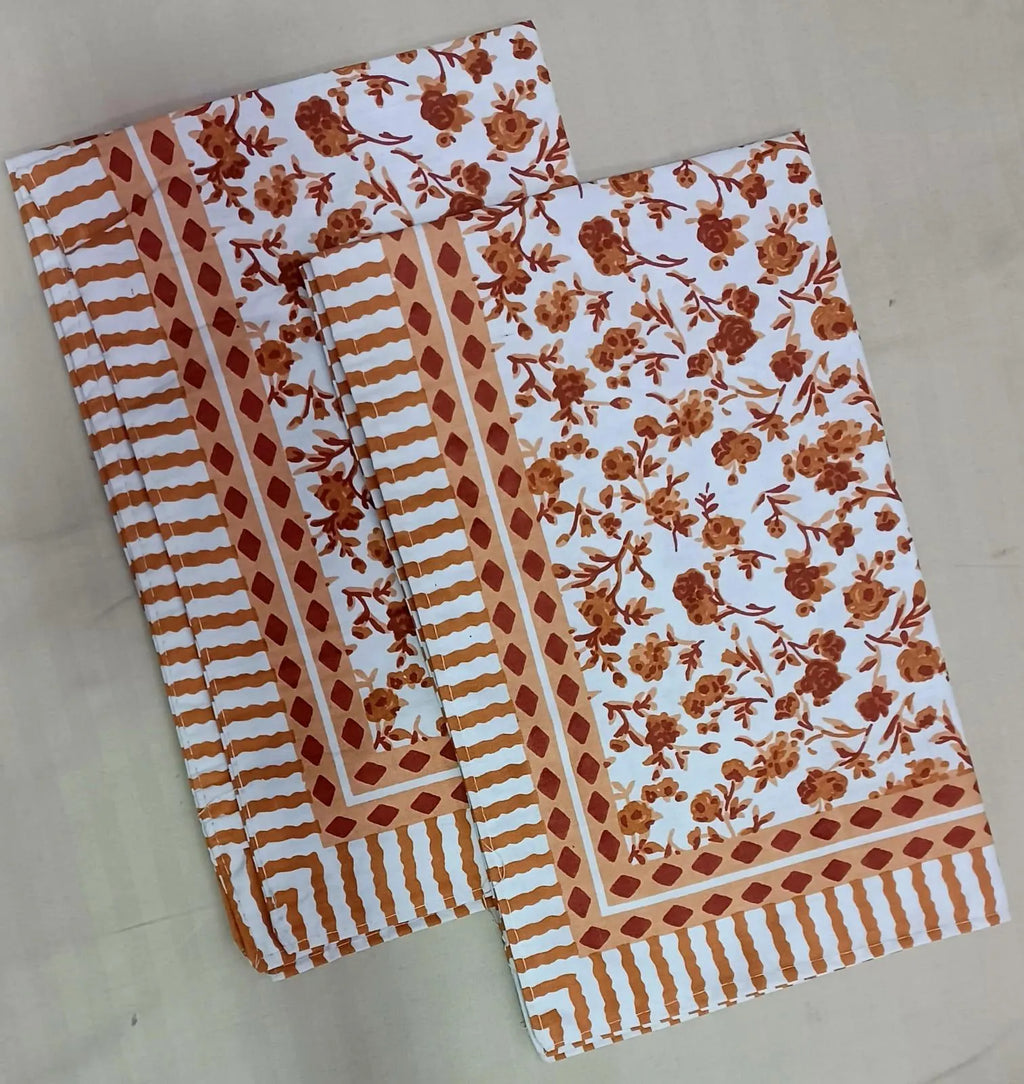 Brown floral print pure cotton pillow covers folded on flat surface