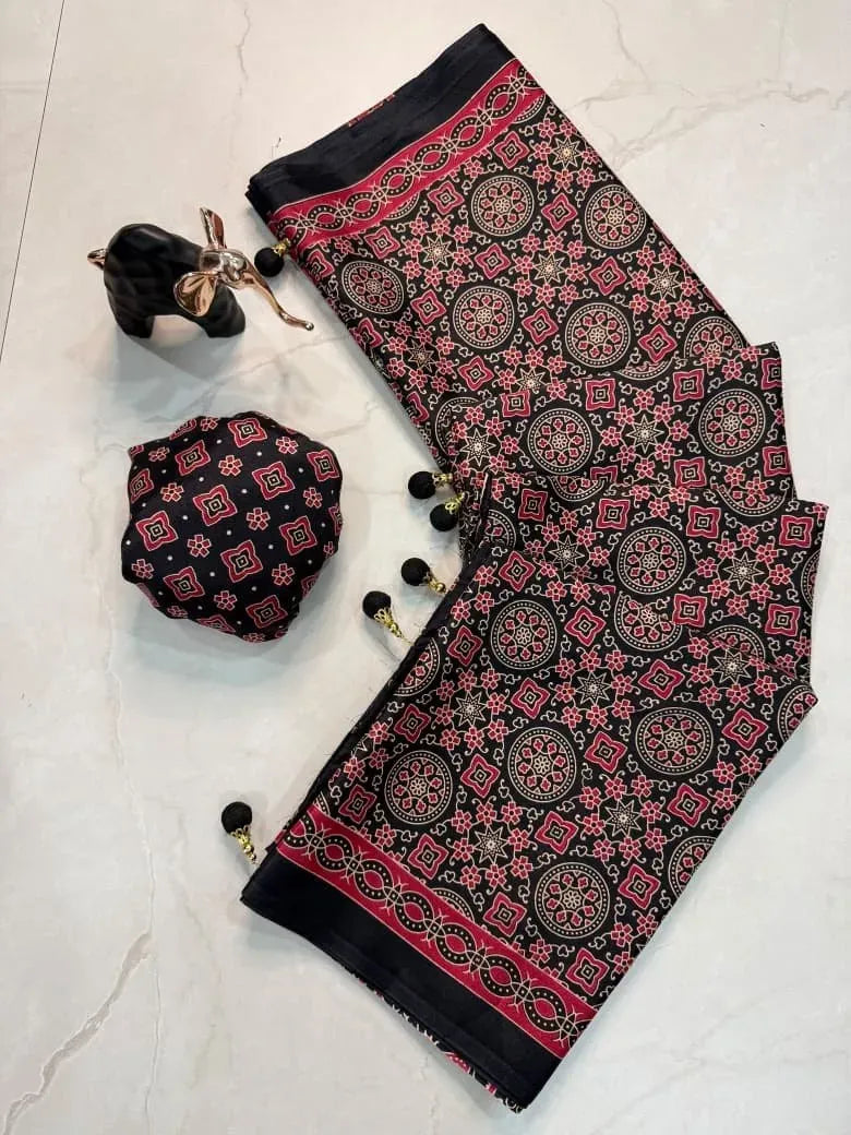 Black ajrakh printed gajji silk saree with decorative elephant showpiece