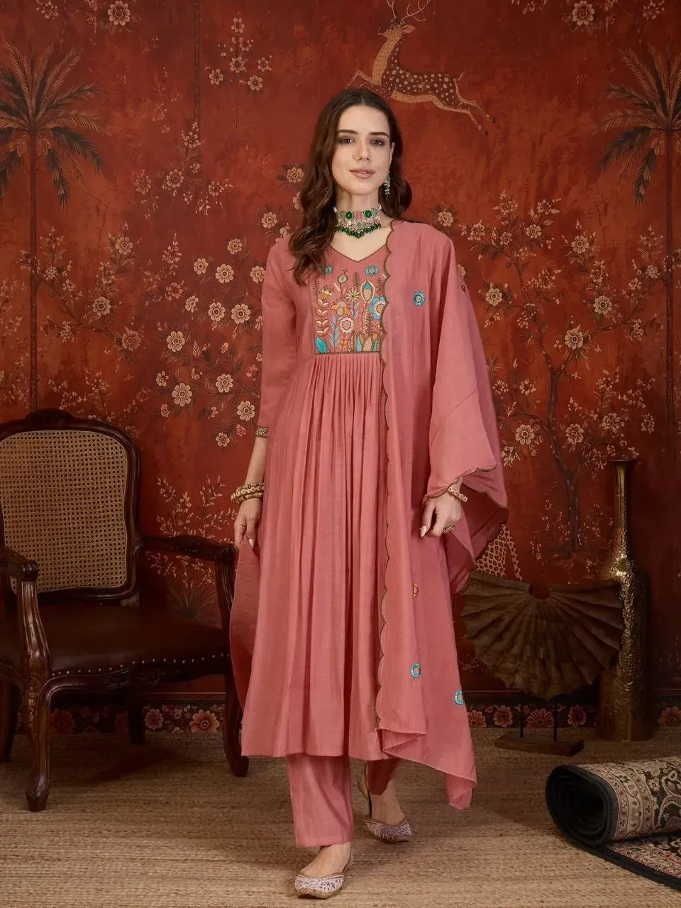 Model wearing pink Chanderi kurti set with heavy embroidery and dupatta