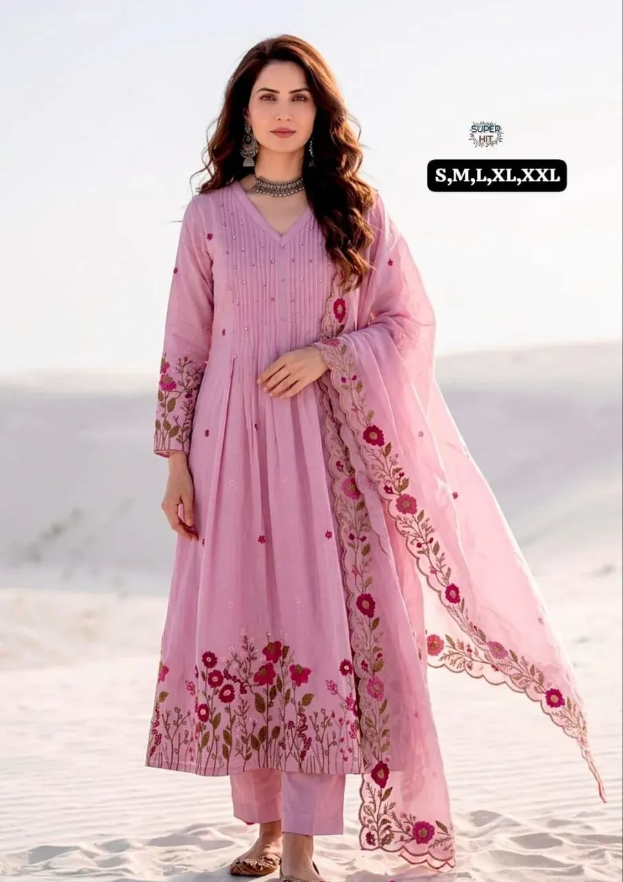 Model wearing pink chanderi silk kurti set with floral embroidery and dupatta
