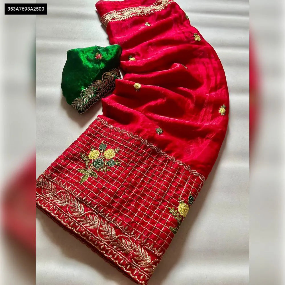 TRENDBUY Premium Space Chiffon Saree in Red with Zari Embroidery and Green Contrast Blouse, flat lay