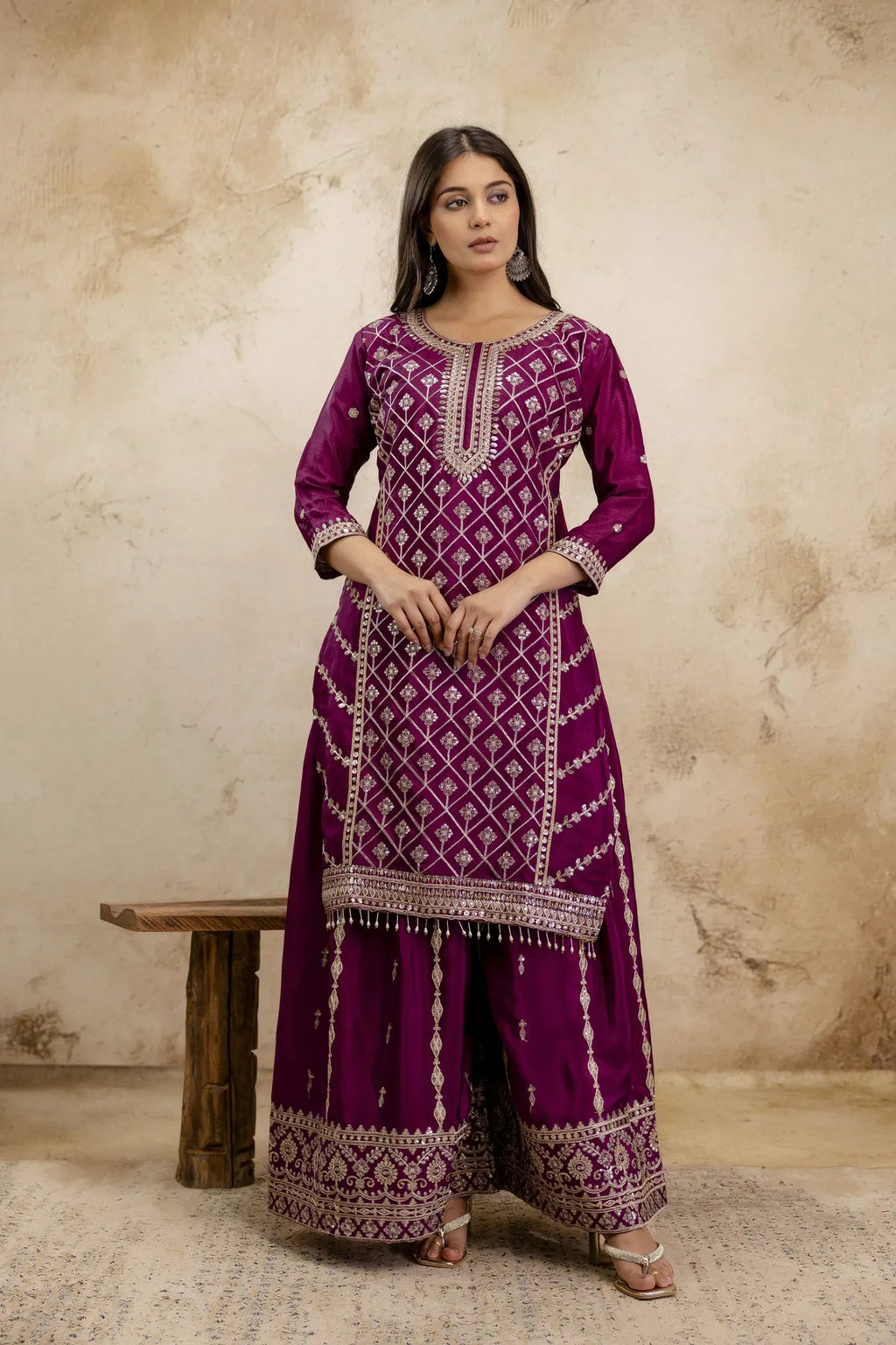 Full body front view of model wearing wine chinon sharara suit with embroidery