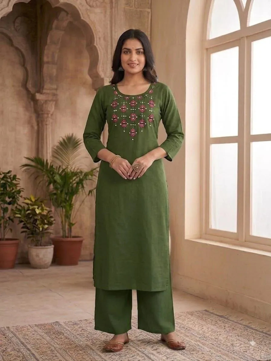Full length front view of model in olive green ethnic co-ord set