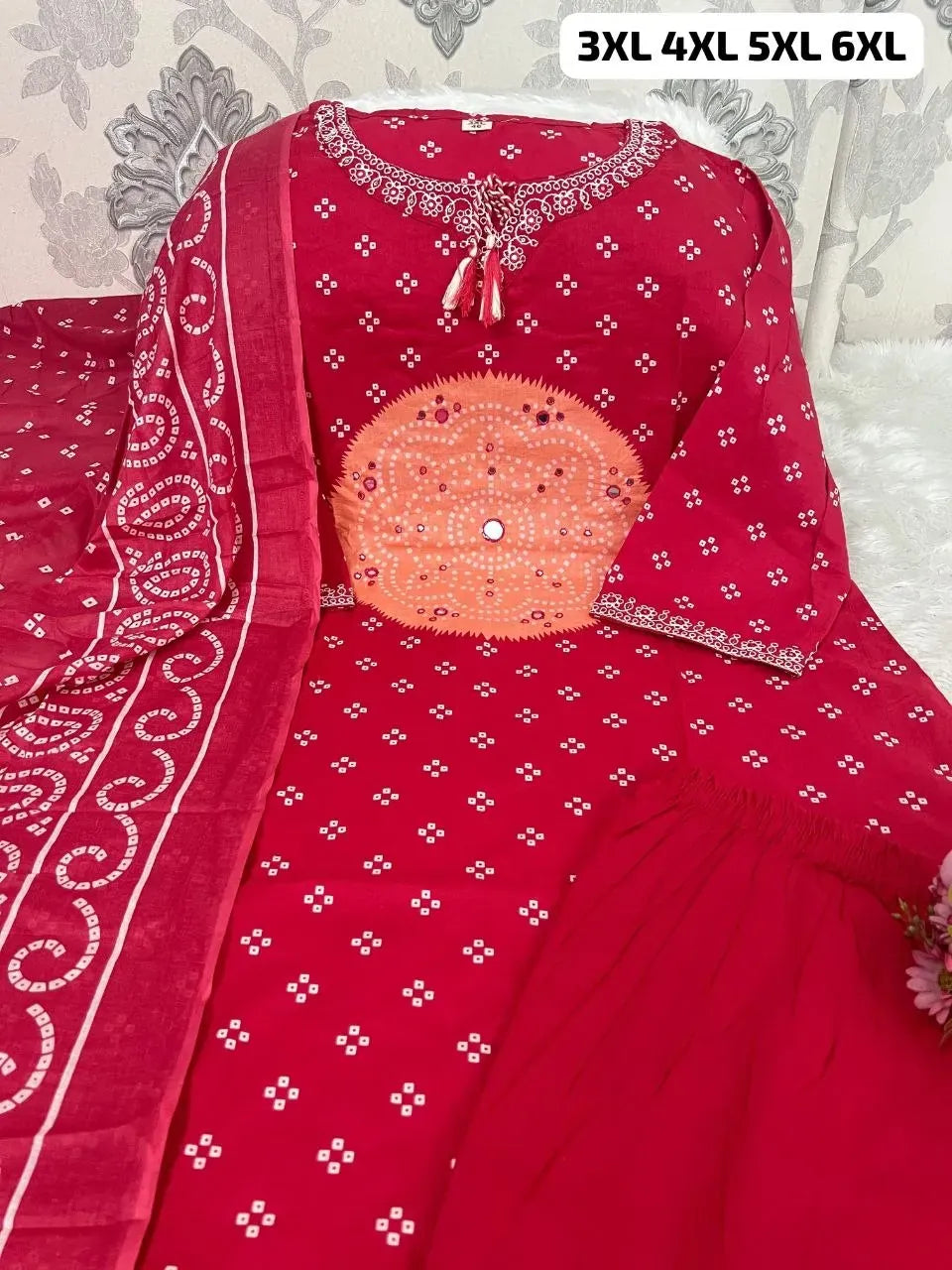 Red pure mul cotton kurti with pant and matching dupatta featuring embroidery and mirror work