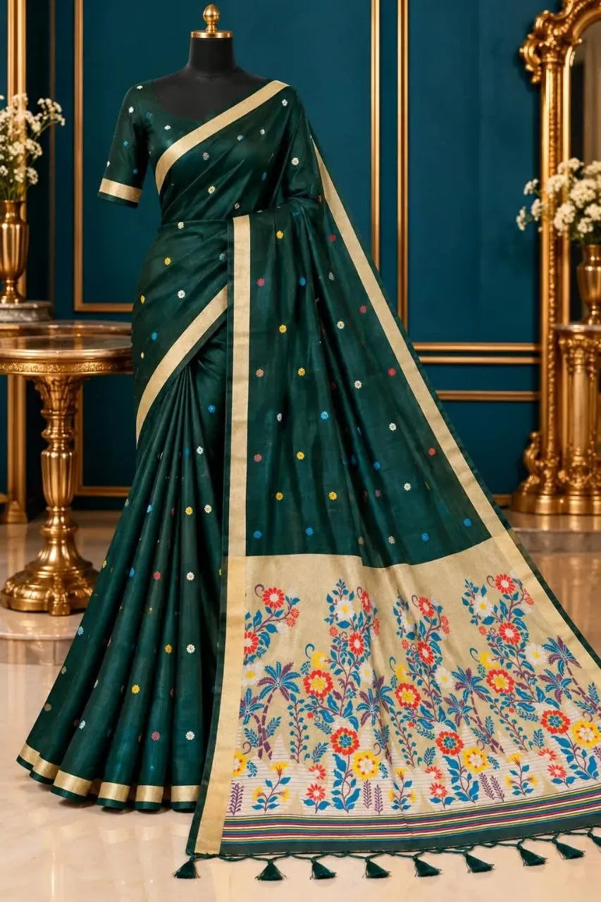 Dark green cotton saree with colorful floral motifs on mannequin
