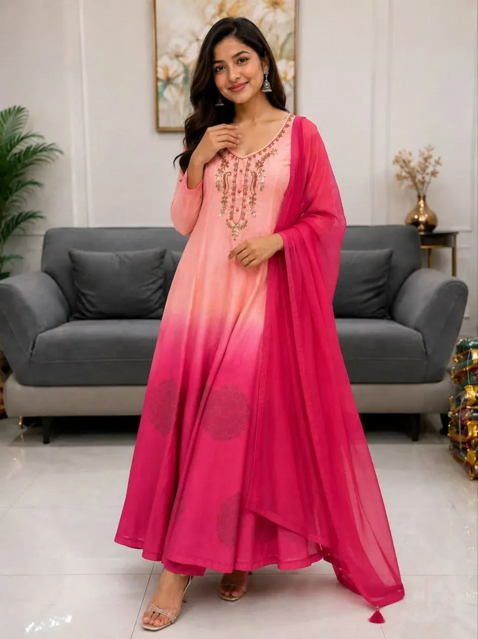 Model wearing orange and pink ombre chiffon anarkali gown set