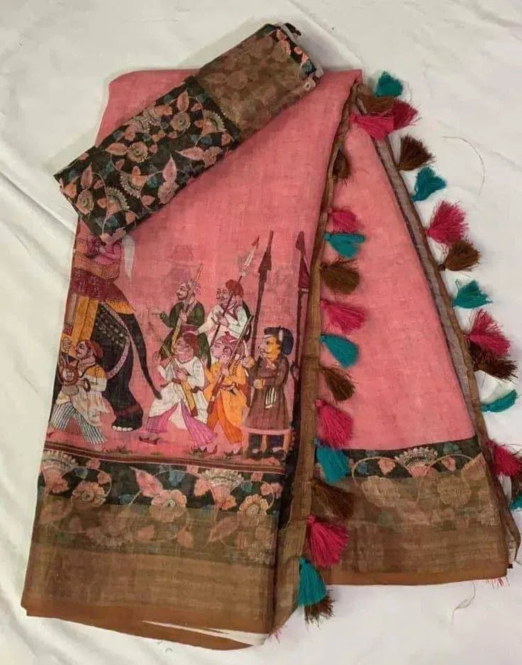 Pink linen saree with digital print and colorful tassels laid flat