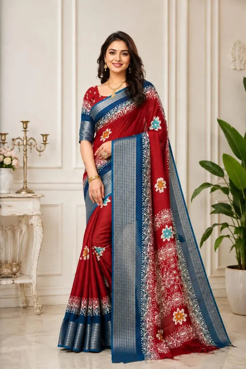 Model wearing red and blue printed dola silk saree with zari border