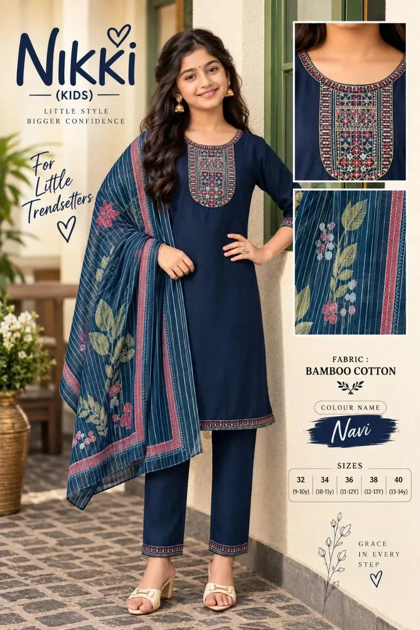 Young girl wearing a navy blue bamboo cotton ethnic suit with embroidered yoke and floral dupatta