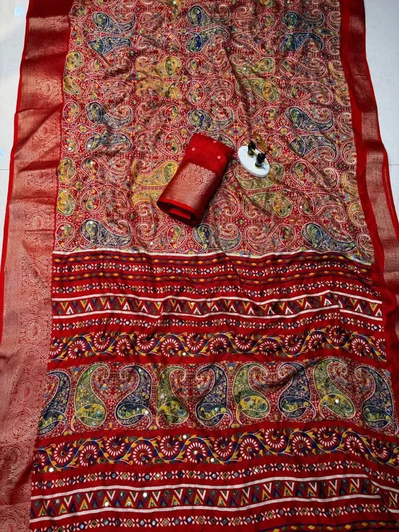 Full flat lay view of red georgette saree with intricate border details