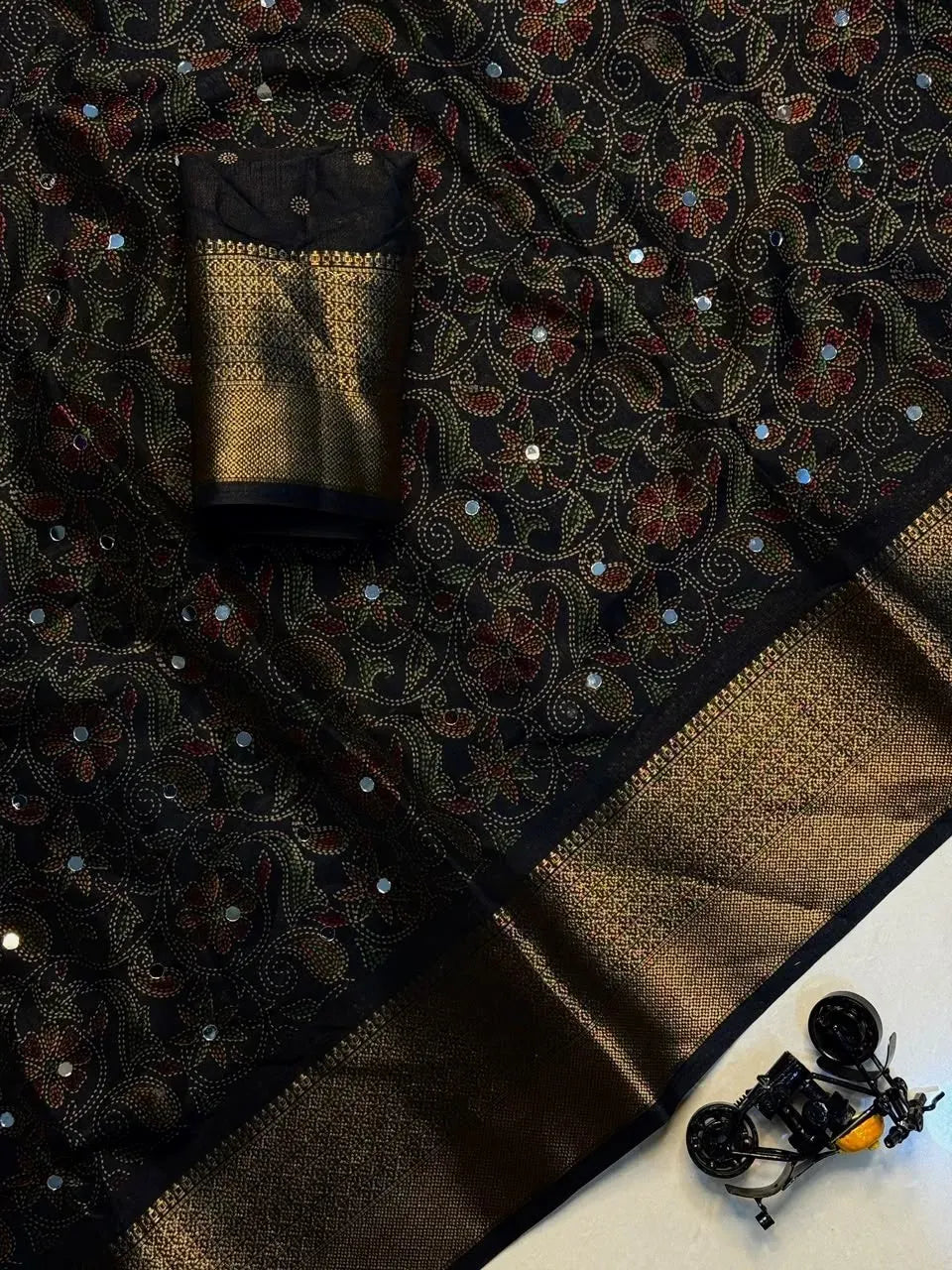 Black georgette saree with Kalamkari print and heavy mirror work
