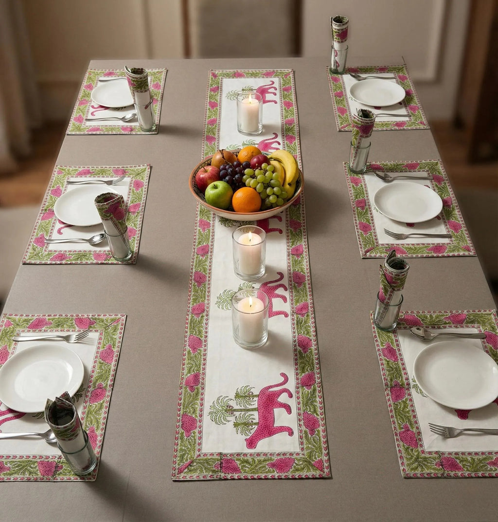Hand block print pink elephant table mat set with matching runner on dining table