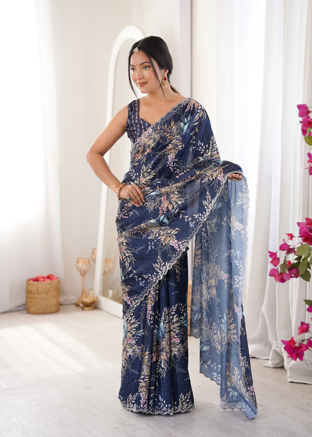 Model wearing navy blue digital printed chinnon saree with swarovski work
