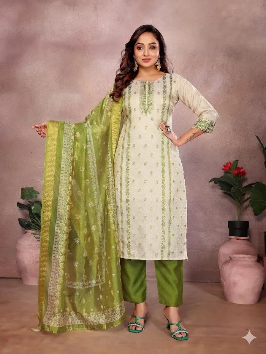 Model wearing cream jacquard suit with green dupatta and pants