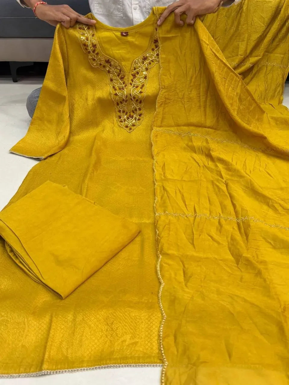 Yellow Kanjivaram silk kurti set with heavy embroidery and matching dupatta