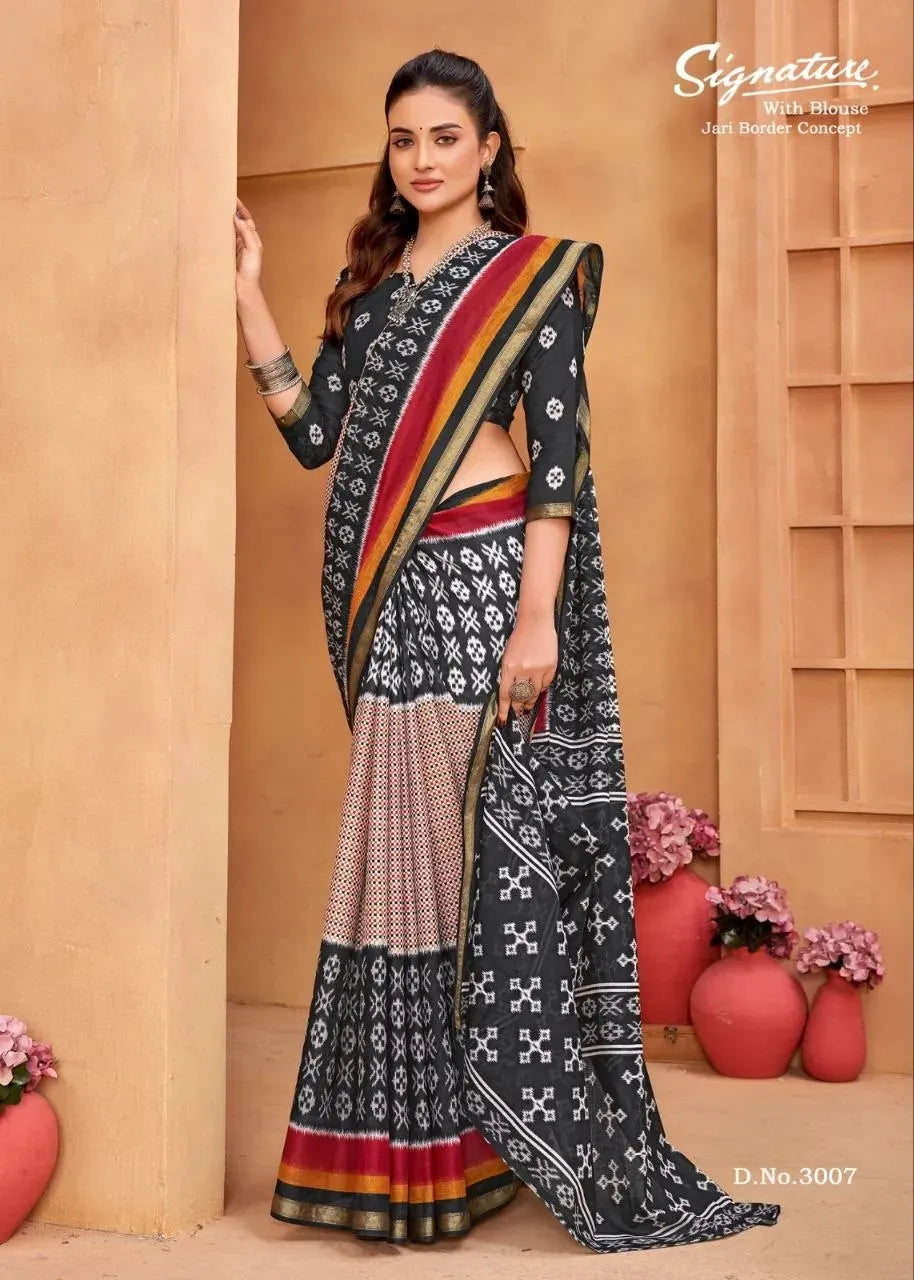 Model wearing black and red printed mal cotton saree with jari border