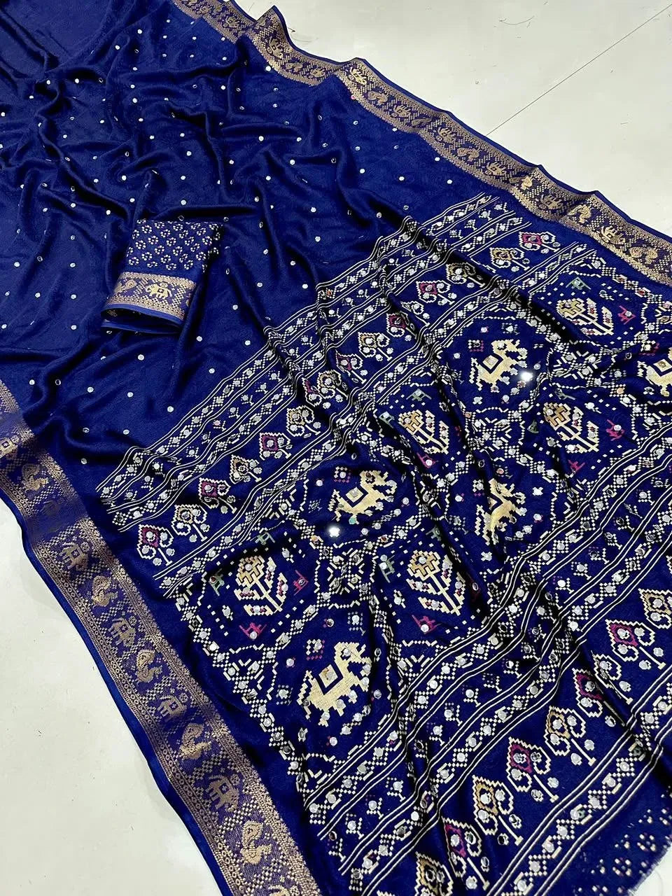 Royal blue soft georgette saree with authentic mirror work and gold jacquard border