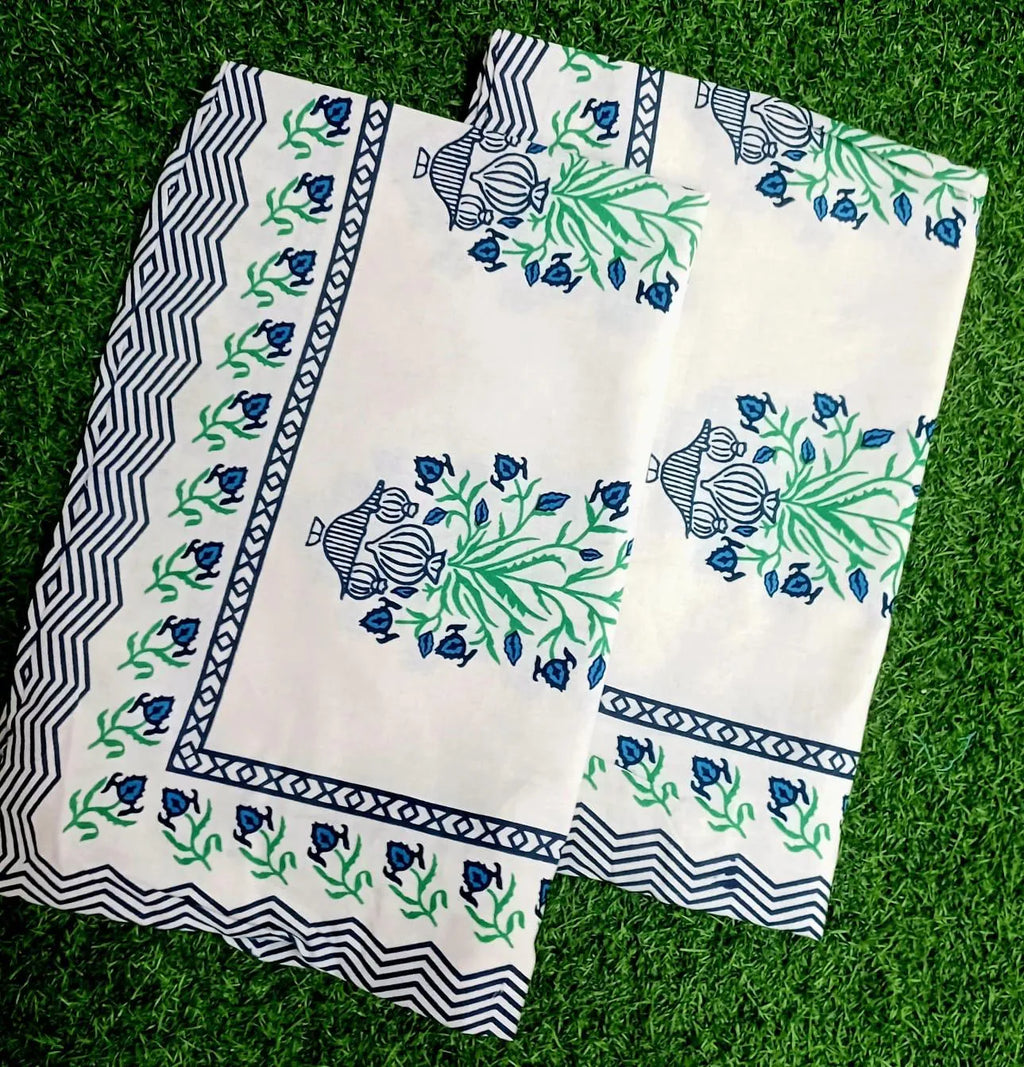 White cotton pillow cover with blue and green floral print
