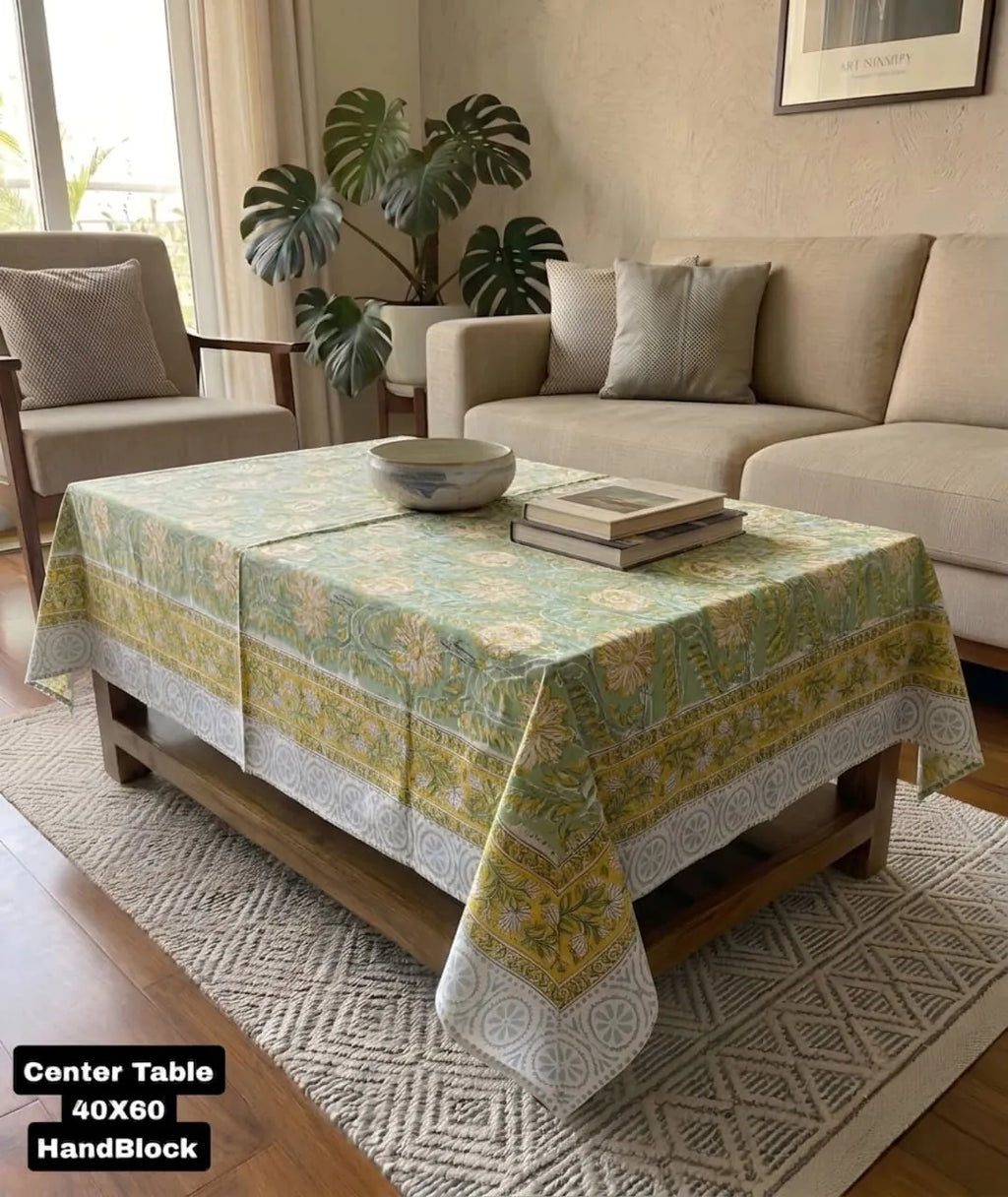 Green floral Sanganeri block print cotton center table cover on wooden table