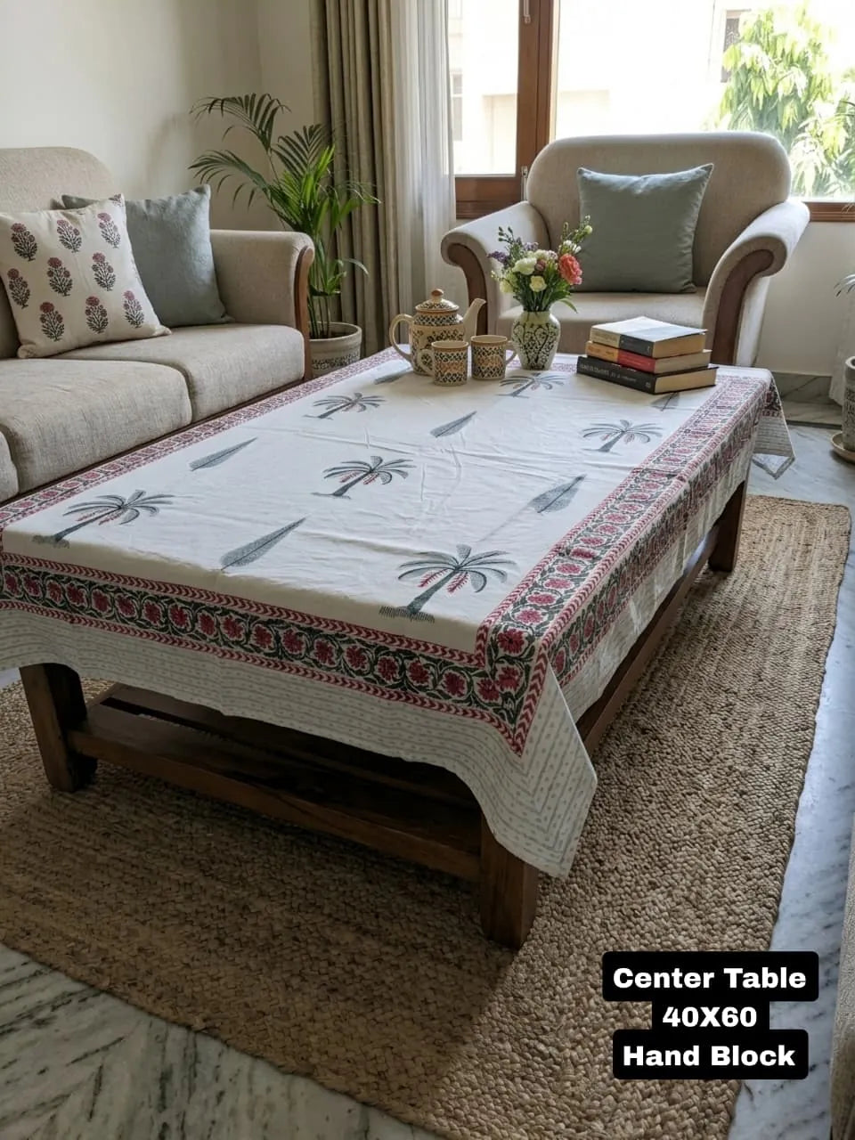 Green palm leaf Sanganeri block print cotton table cover on center table