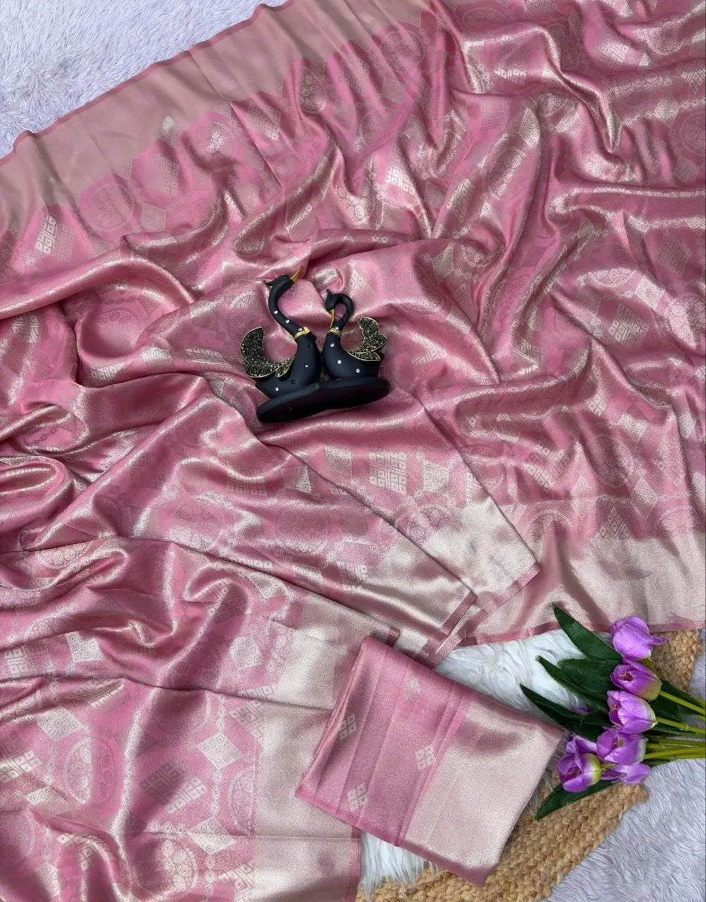 Pink soft tissue satin silk saree with two tone shading laid flat