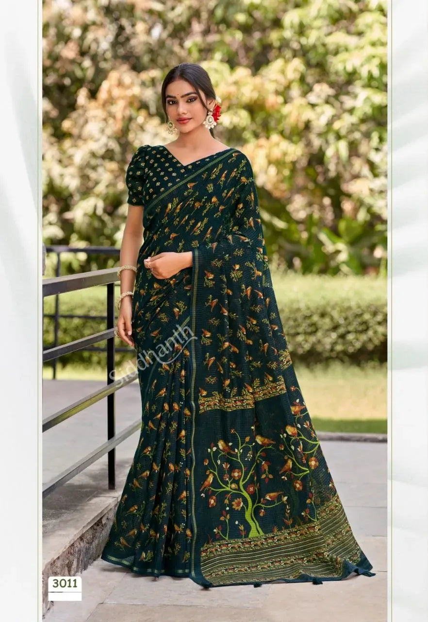 Model standing in dark green Varanasi cotton saree outdoors