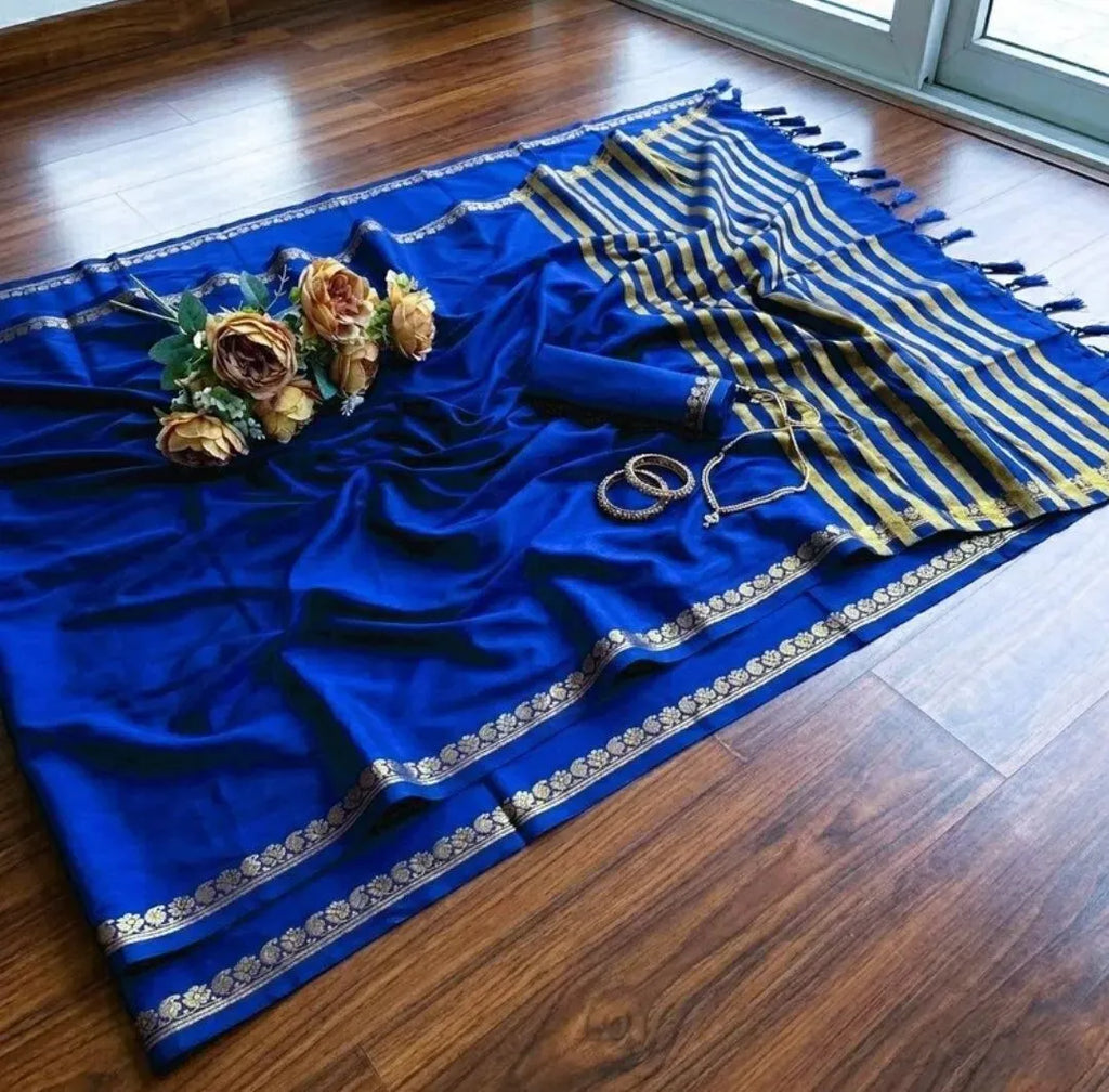 Royal blue viscose silk saree with gold border and floral arrangement