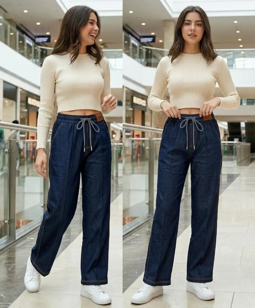Model wearing dark blue stretchable wide leg jeans with white top