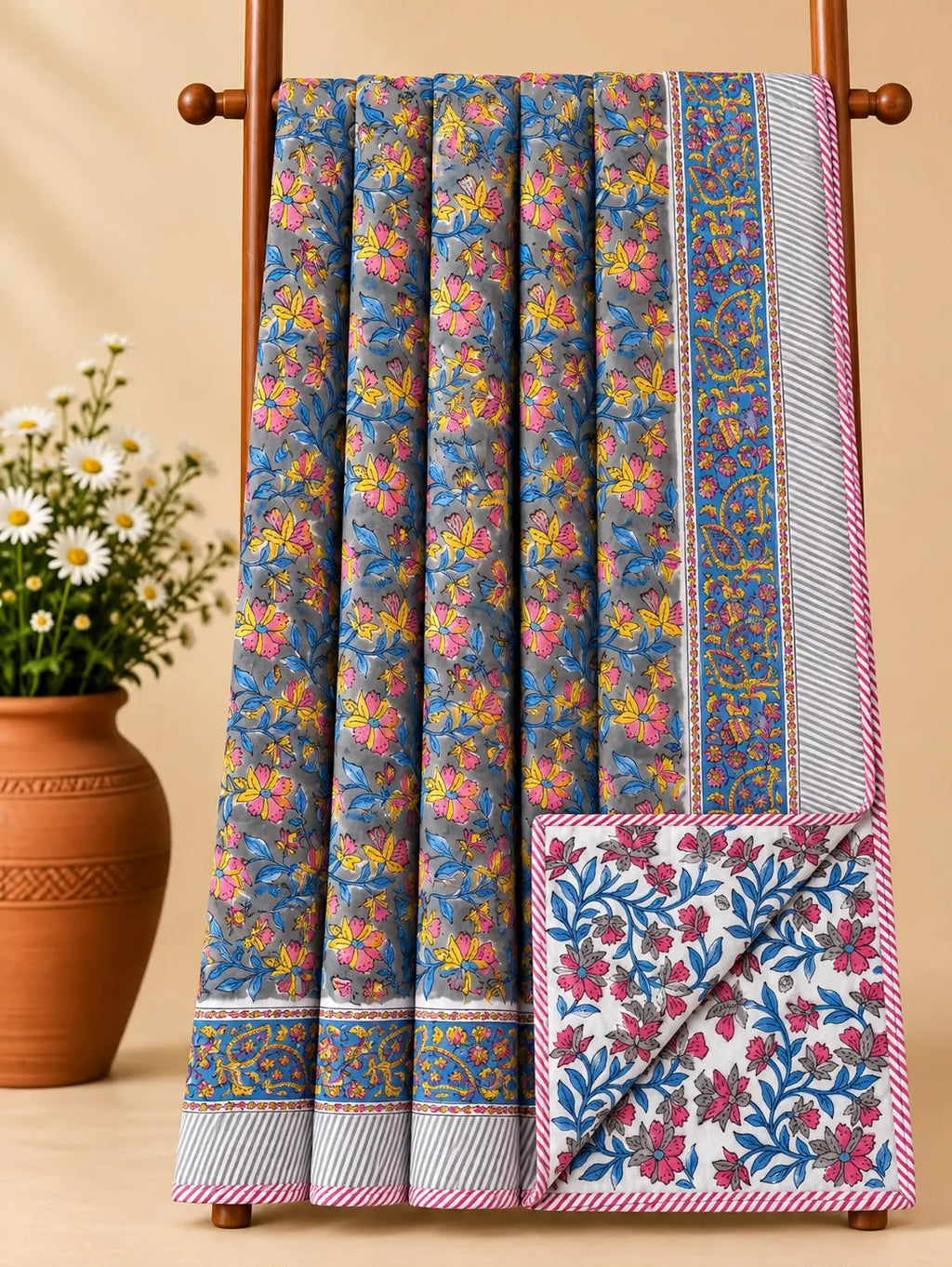 Grey and blue floral hand block printed pure cotton reversible king size dohar hanging on wooden ladder
