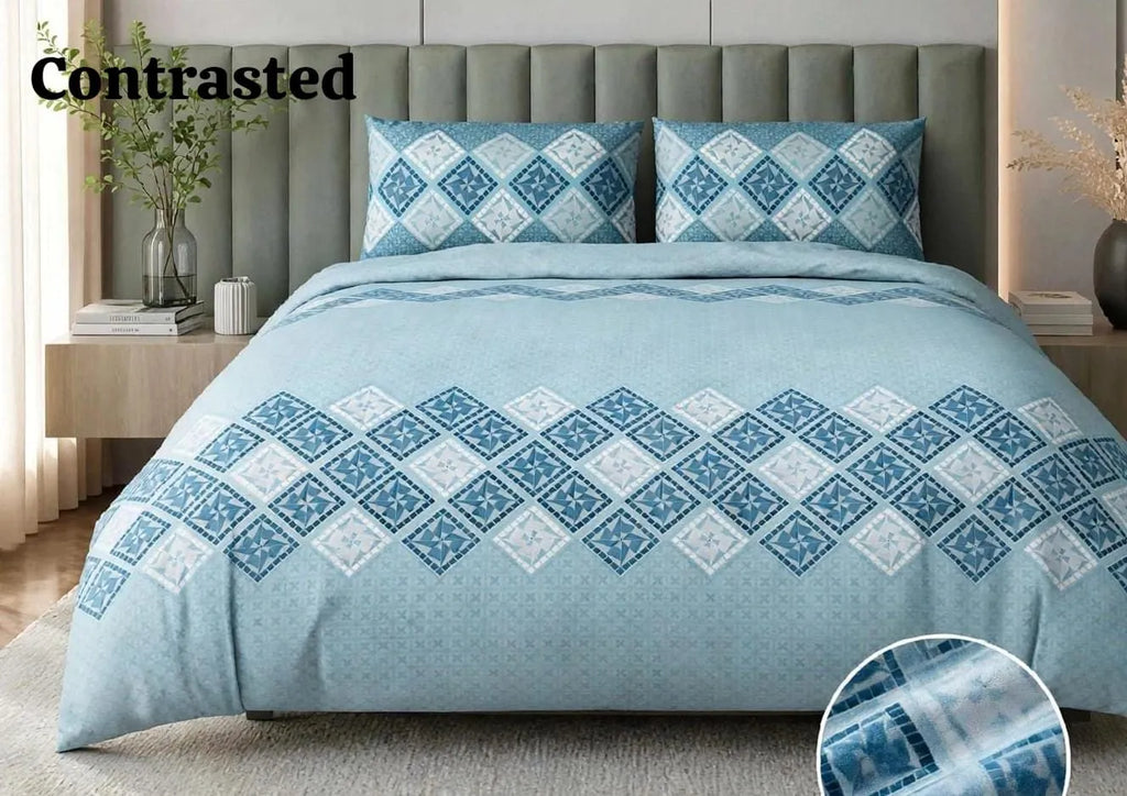 Blue geometric print pure cotton super king bedsheet with matching pillow covers on bed
