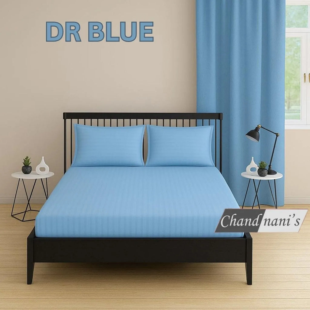 Dark blue striped cotton super king bedsheet with matching pillow covers on bed